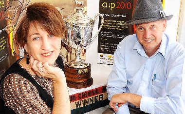 It's here: Celina Hellyar, owner-manager of The House of Horton, and Lismore Turf Club secretary-manager, Michael Timbrell, with the 1922 Lismore Cup display. It's here: Celina Hellyar, owner-manager of The House of Horton, and Lismore Turf Club secretary-manager, Michael Timbrell, with the 1922 Lismore Cup display.